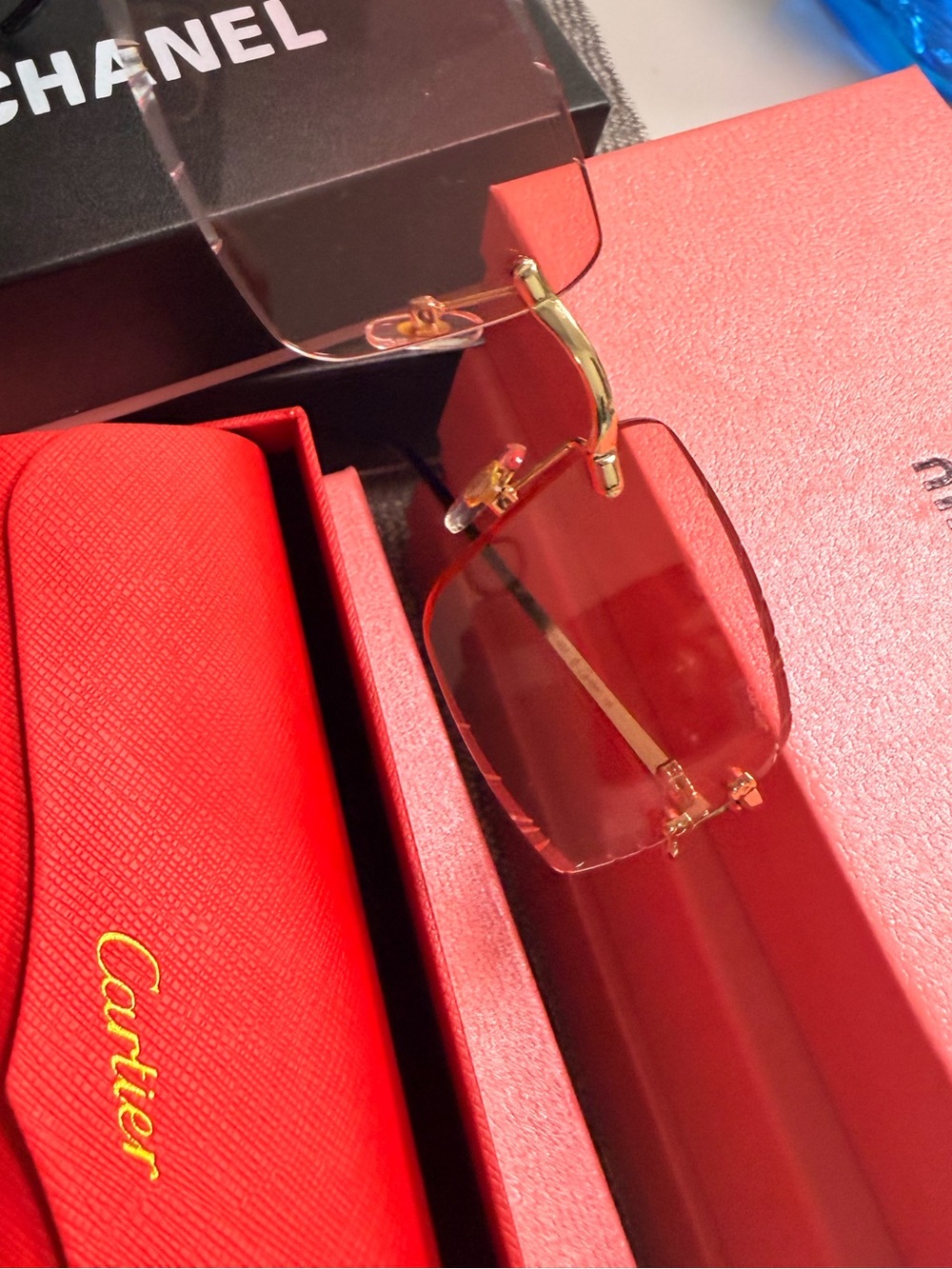 Chanel x Cartier Clear and Red Rimless Sunglasses - Gold Accent